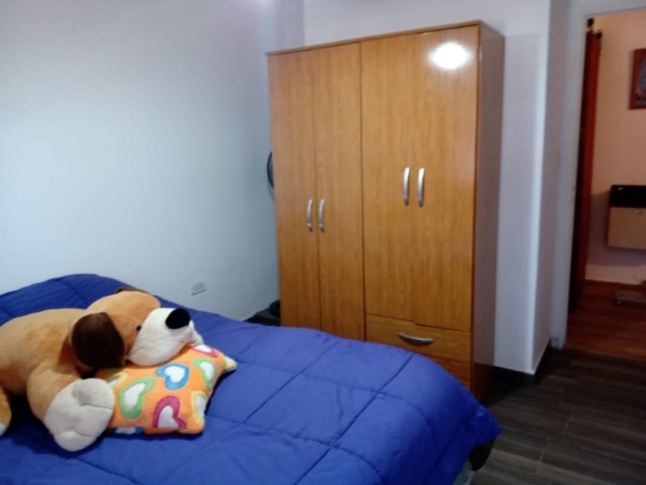 VENTA EN SANTA TERESITA CASA DE 4 AMBIENTES , EXCELENTE UBICACION, GAS NATURAL Y COCHERA