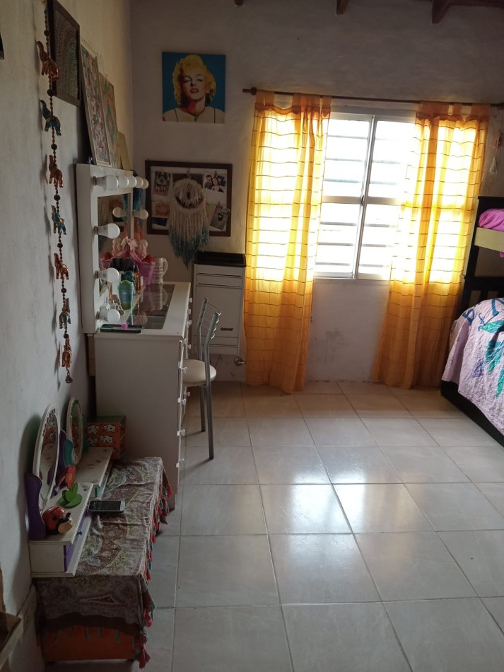 CHALET 3 AMBIENTES CON FONDO LIBRE